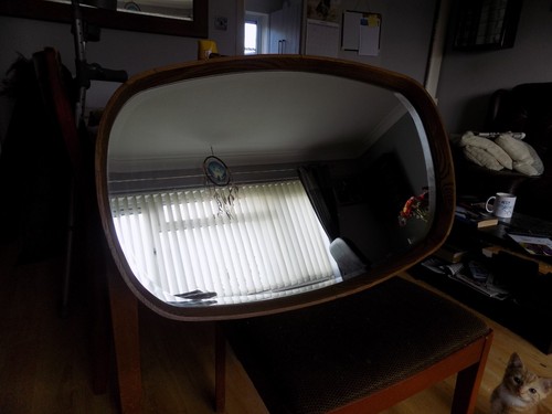 Walnut framed oval mirror